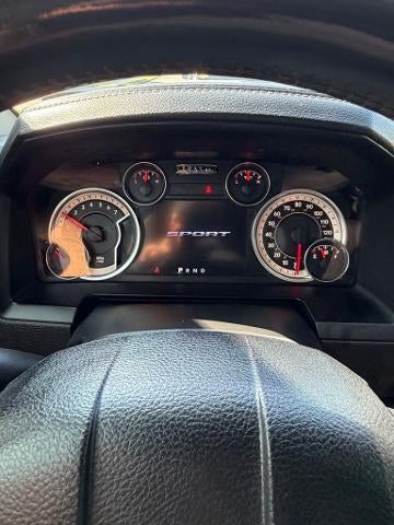 2015 RAM 1500 4WD Quad Cab 6.4 Ft Box Sport