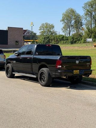 2015 RAM 1500 4WD Quad Cab 6.4 Ft Box Sport